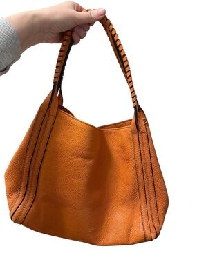 Textured Orange Leather Shoulder Bag with Braided Handle
